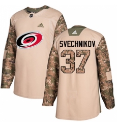 Men's Adidas Carolina Hurricanes #37 Andrei Svechnikov Authentic Camo Veterans Day Practice NHL Jersey