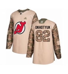 Men's New Jersey Devils #82 Nikita Okhotyuk Authentic Camo Veterans Day Practice Hockey Jersey