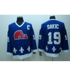 Nordiques #19 Joe Sakic Stitched CCM Throwback Blue NHL Jersey