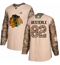 Youth Adidas Chicago Blackhawks #82 Jordan Oesterle Authentic Camo Veterans Day Practice NHL Jersey