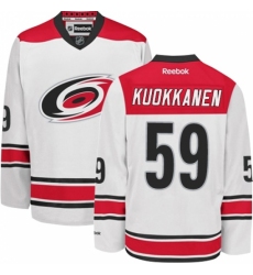 Women's Reebok Carolina Hurricanes #59 Janne Kuokkanen Authentic White Away NHL Jersey