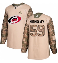 Youth Adidas Carolina Hurricanes #59 Janne Kuokkanen Authentic Camo Veterans Day Practice NHL Jersey