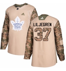 Youth Adidas Toronto Maple Leafs #37 Timothy Liljegren Authentic Camo Veterans Day Practice NHL Jersey